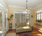 Sitting area with glass doors to backyard wood floors yellow walls white baseboards windows on all walls with white and light brown blinds