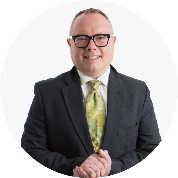 kelly-king Kelly King wearing a gray suit with green tie