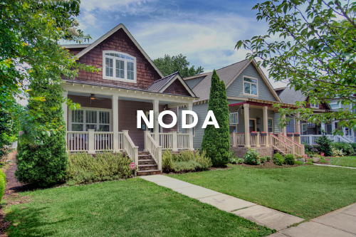Home with brown shingles and brown siding white columns and railing on front porch and the word NODA typed over the image in white font