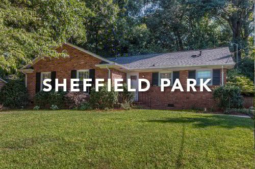 Brown brick home with black shutters and large front yard and the words Sheffield Park typed over the image in white font