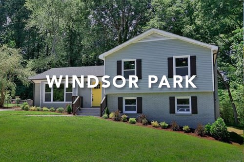 Gray home with yellow front door large front yard and Windsor Park typed over the image